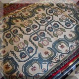 R108. Synovia 100% wool rug. Approx. 4' x 6'